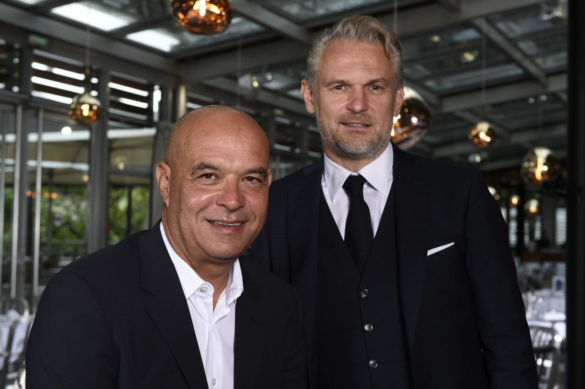 Members of The Table of Taste team in a Maison Bocuse brasserie dining room