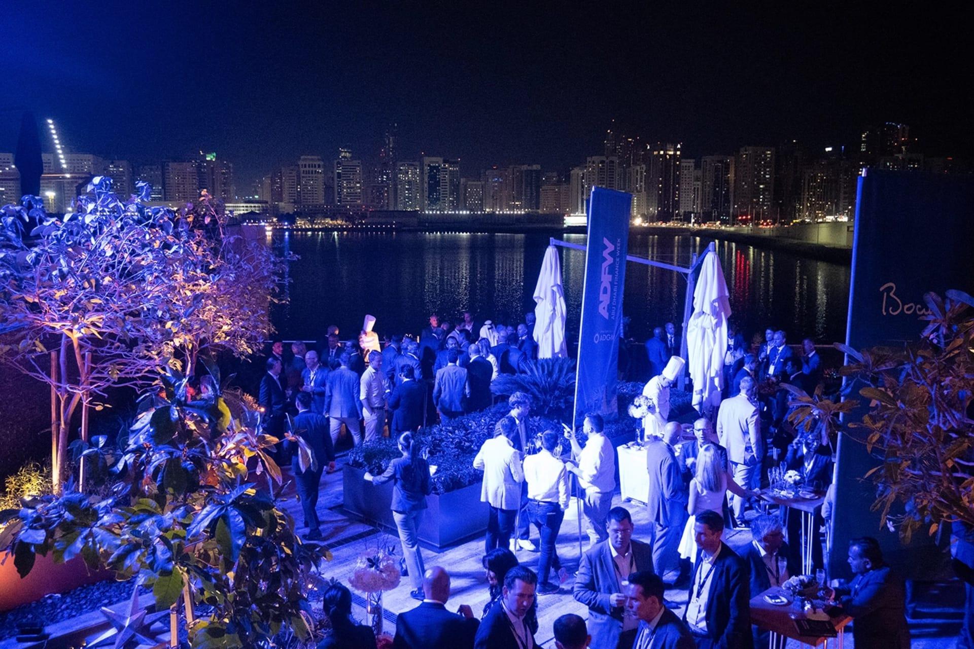 Evening cocktail reception by the water at Abu Dhabi Finance Week